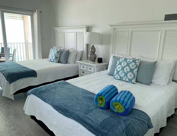 Sand Dollar guest room featuring two queen beds