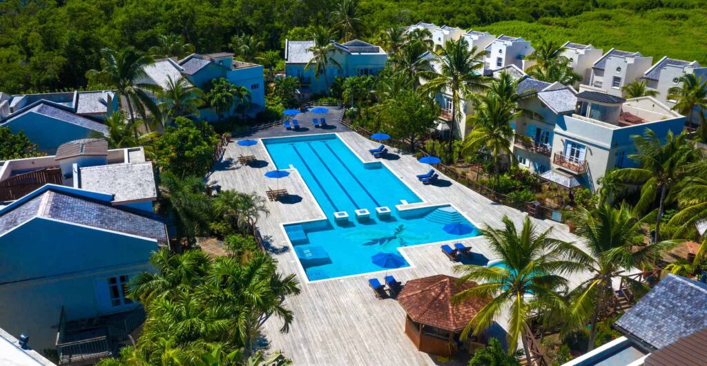 Aerial view of Cap Cove Resort villas and pool