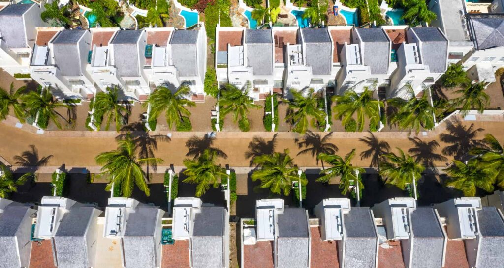 Aerial view of Cap Cove Resort villas with private pools