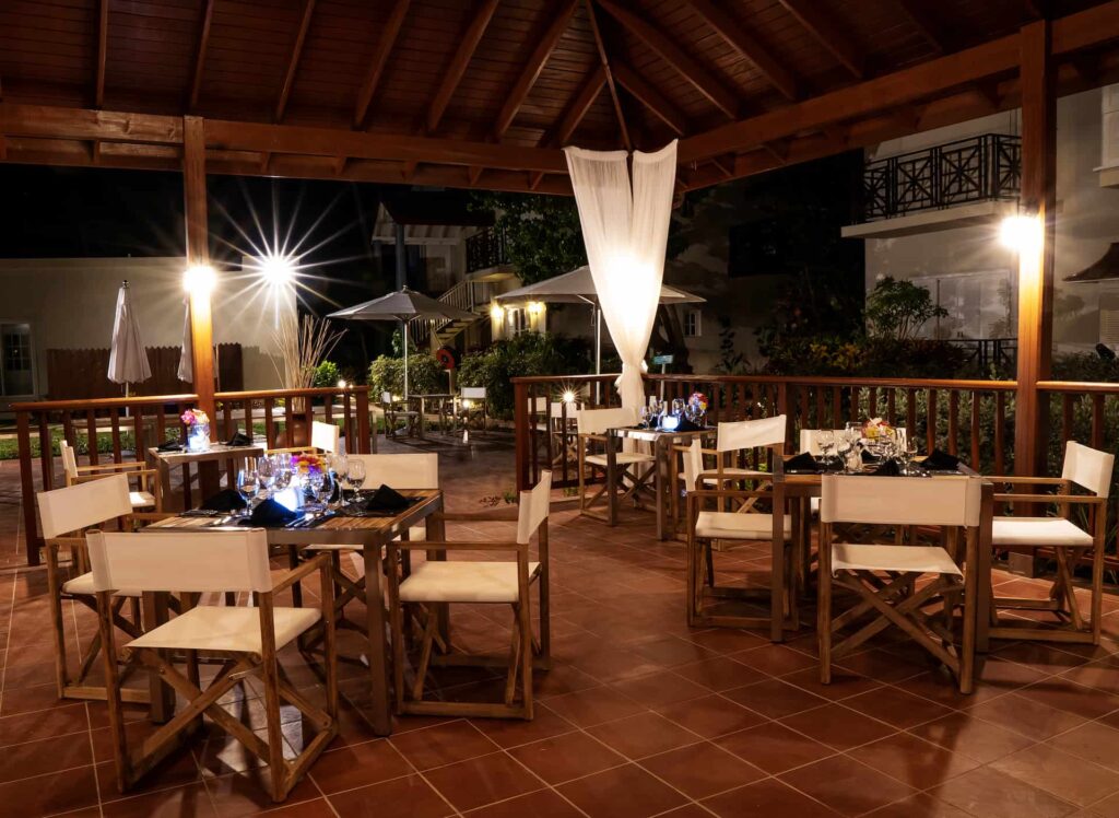 Cap Cove Resort outdoor dining area at night