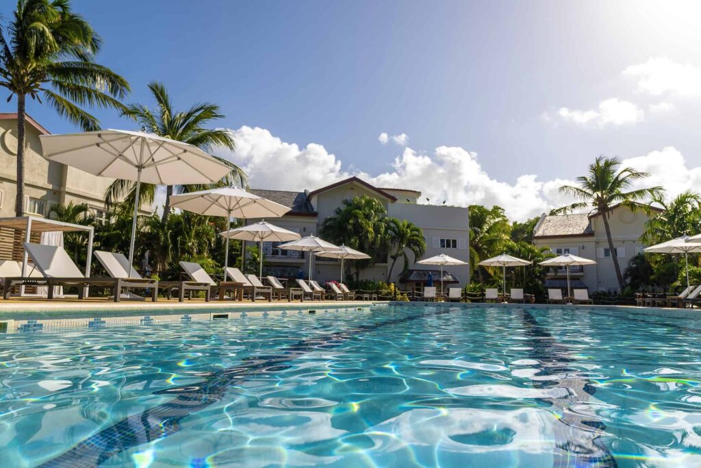 Cap Cove Resort pool surface with view of surrounding suites