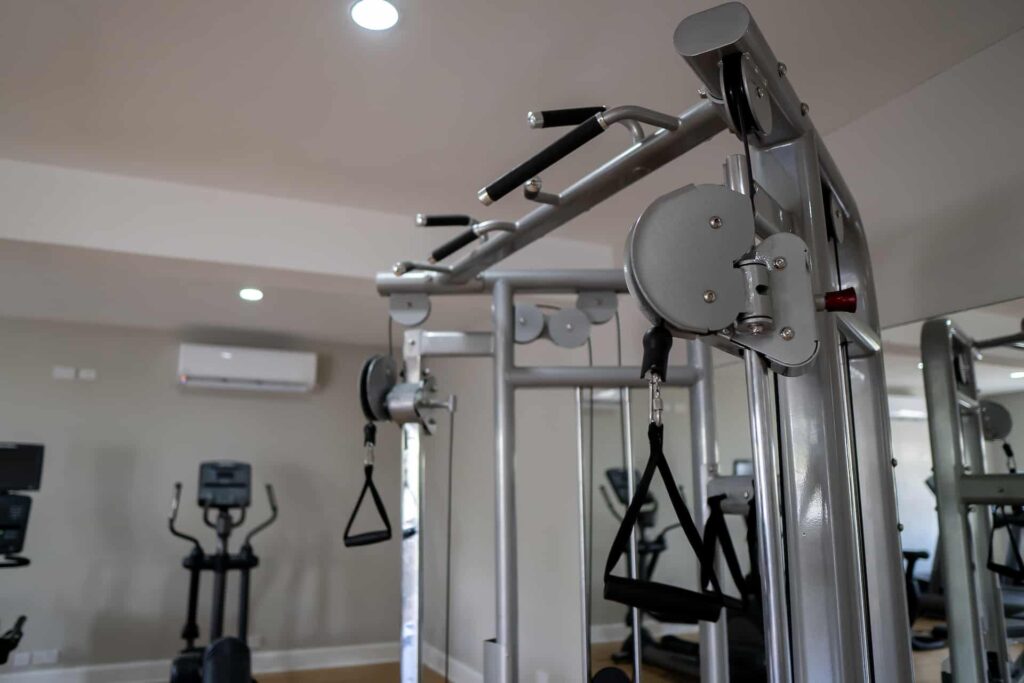 Exercise equipment and weightlifting machines at the Cap Cove Resort fitness center