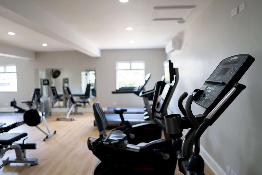 Exercise bikes and other fitness equipment in the Cap Cove Resort fitness center