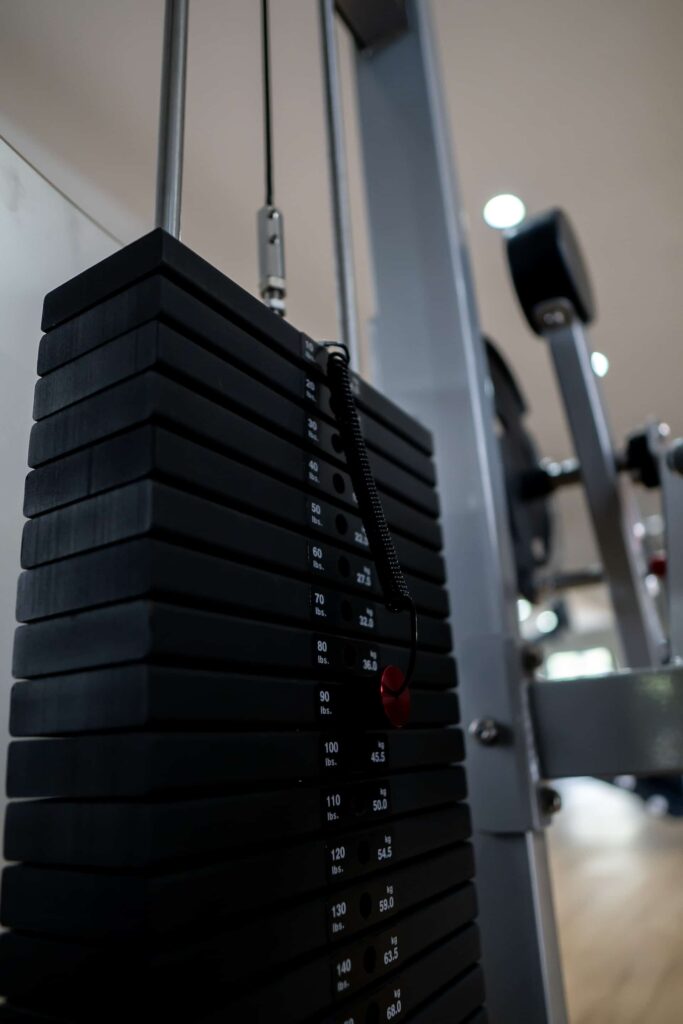Stack of weights on a weightlifting machine at the Cap Cove Resort fitness center