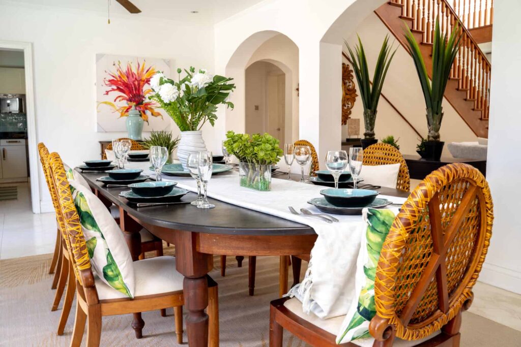 4 Bedroom Villa: Dining room table set for family dinner.