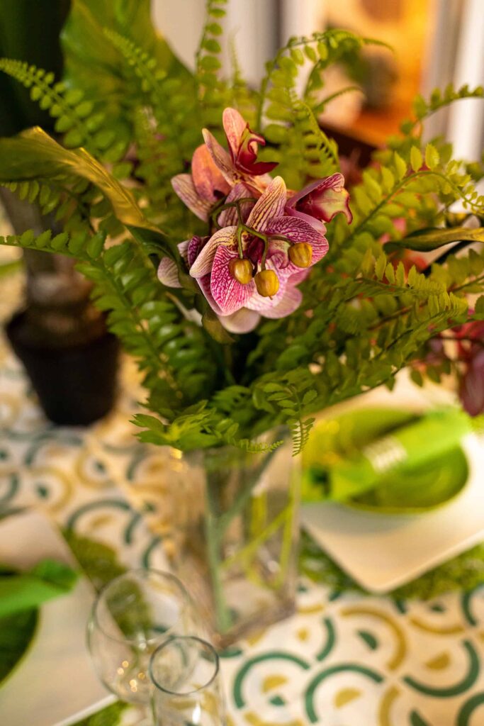Decorative flowers on a dining table set for dinner