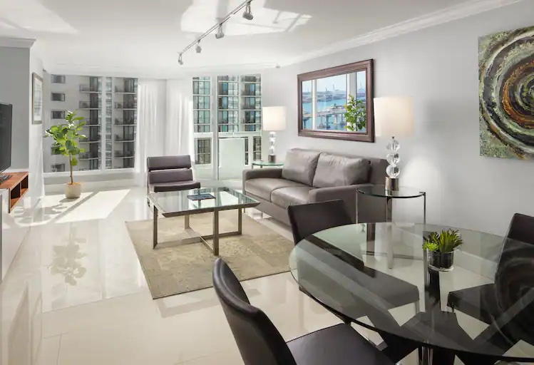 Living room with city view at Grand Hotel Biscayne Bay