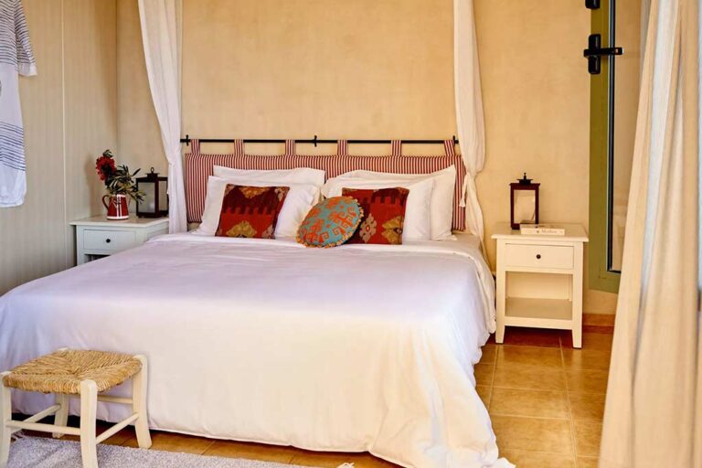 Two Bedroom Family Suite king bed at the Village Heights Resort
