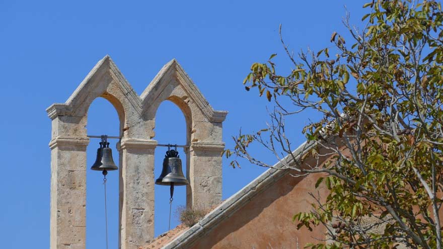 Bells on top of a historical building in Crete, Greece