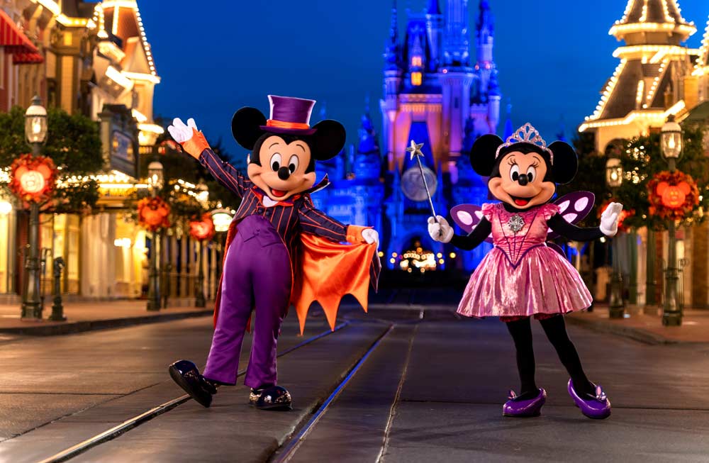 Mickey and Minnie Mouse dressed up for Halloween