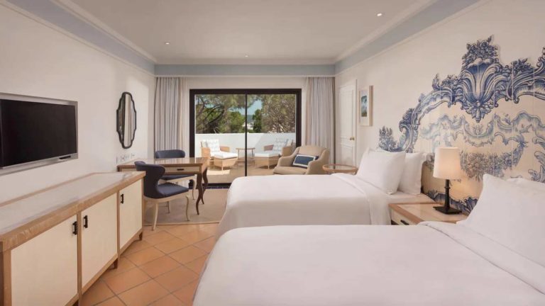 Pine Cliffs Resort - Deluxe Room Resort View with twin beds, seating area and balcony