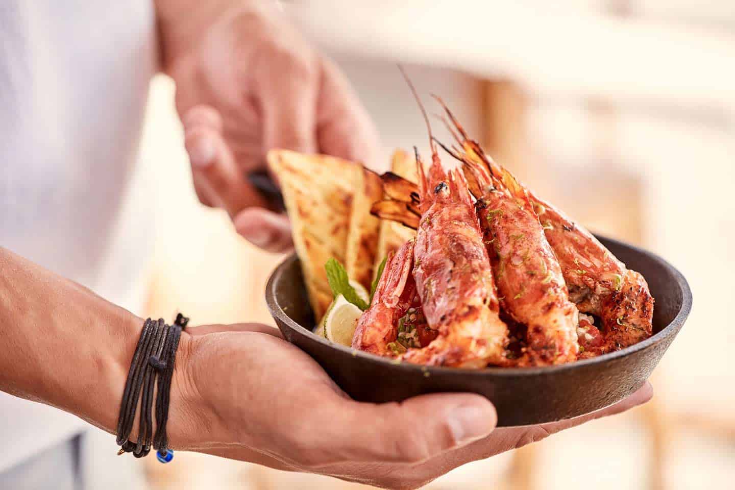 Plated shrimp dish at Bilo Restaurant - Boheme Mykonos