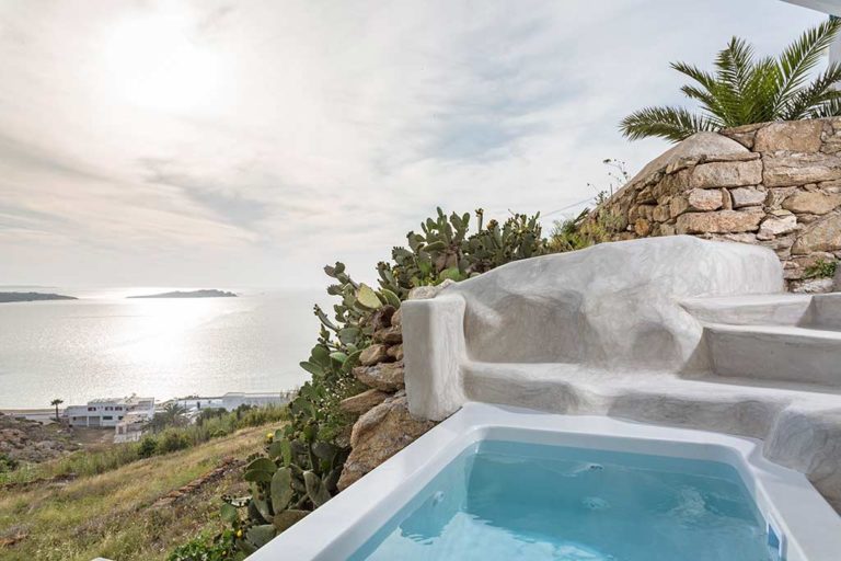 Boheme Mykonos - Bohemian Suite outdoor jacuzzi with a view of the ocean
