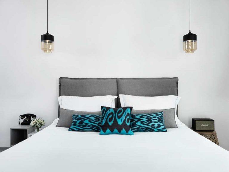 Boheme Mykonos - Honeymoon Suite bed and side tables
