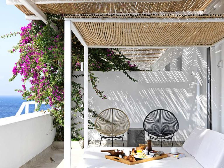 Boheme Mykonos - Honeymoon Suite covered outdoor terrace with lounge furniture