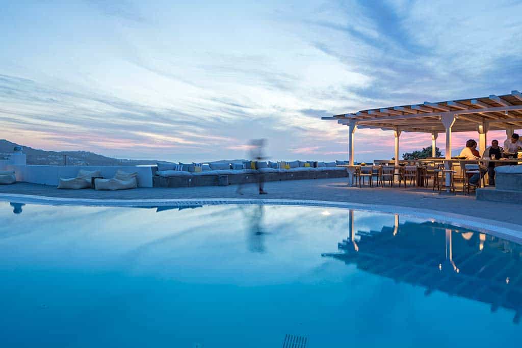 Pool and pool bar at sunset - Boheme Mykonos