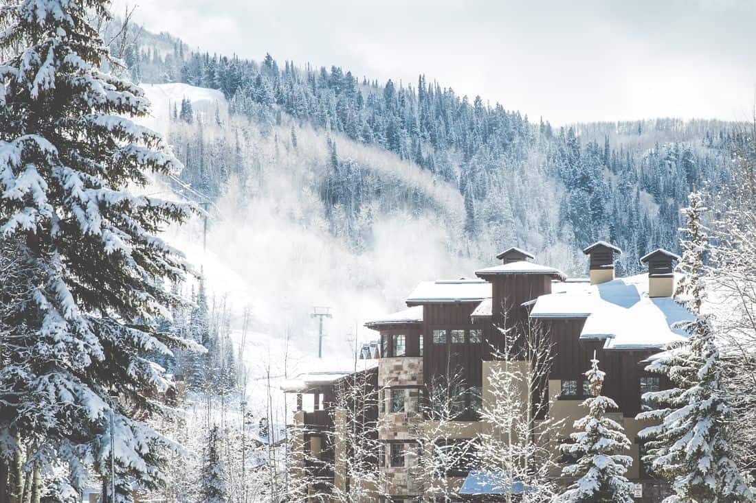 Chateaux Deer Valley hotel in winter overlooking ski slopes