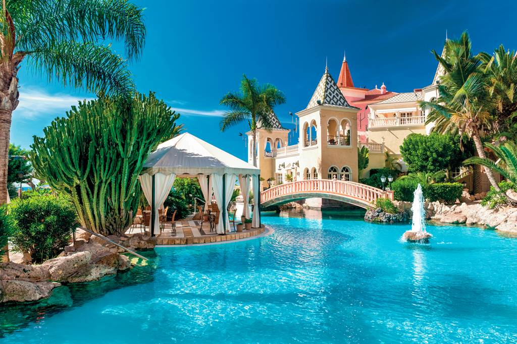 Expansive pool and cabana overlooking the Gran Hotel Bahia del Duque