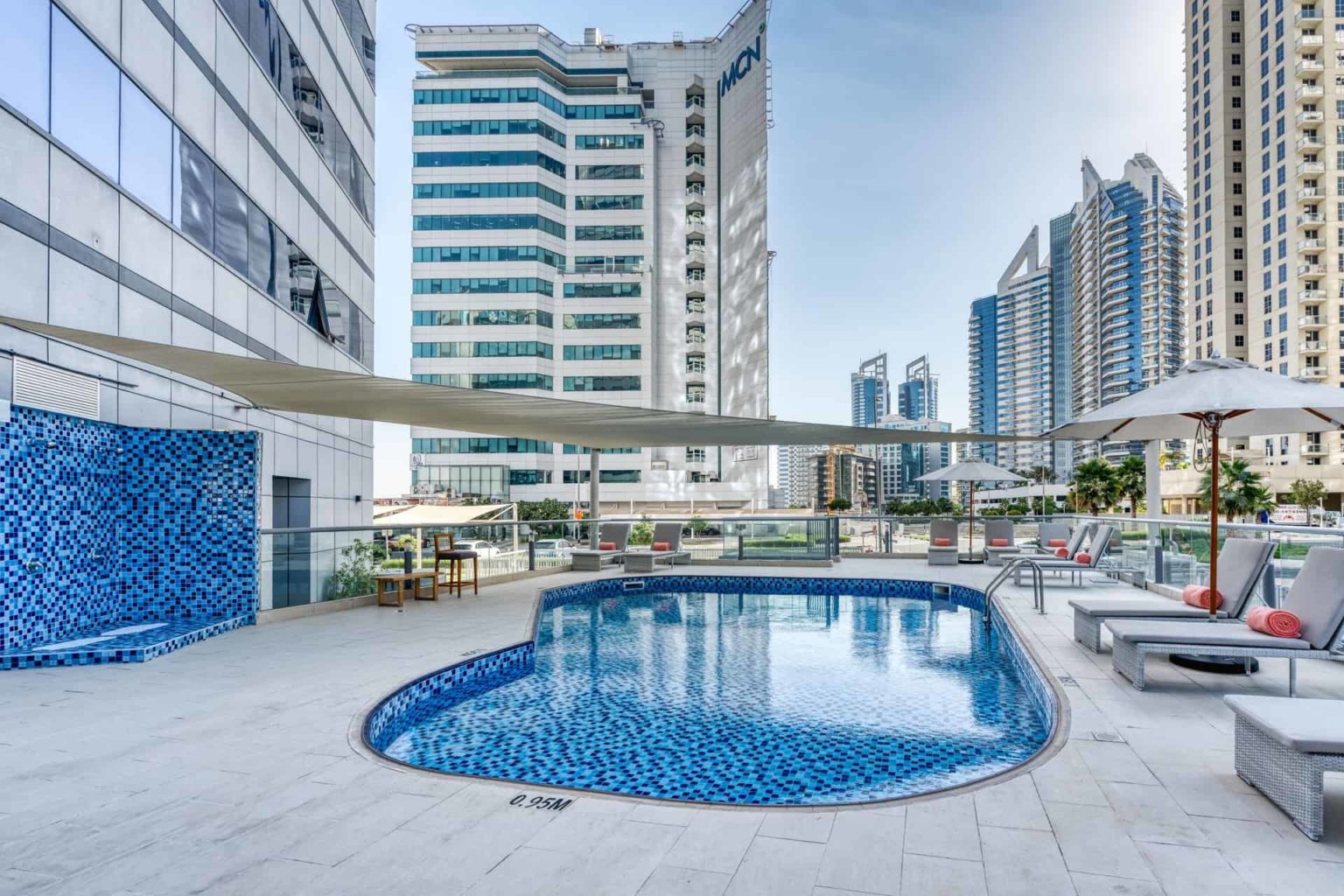 Grand Heights Hotel Apartments outdoor pool overlooking Dubai
