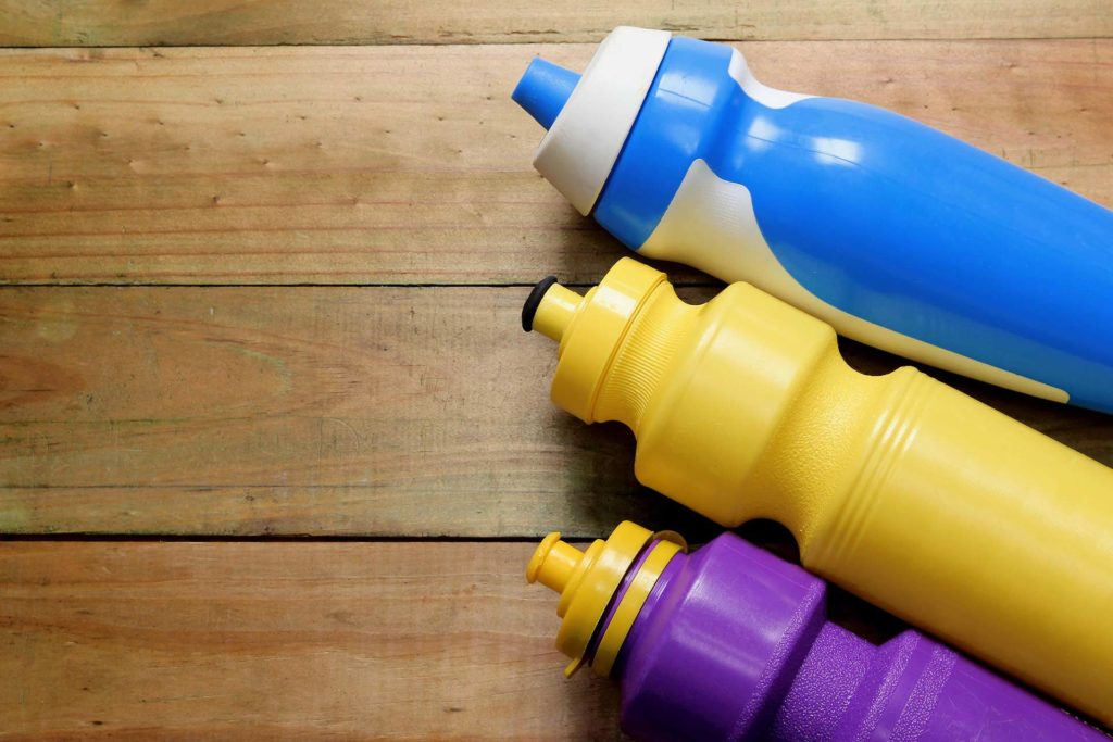 Multicolored plastic sports water bottles