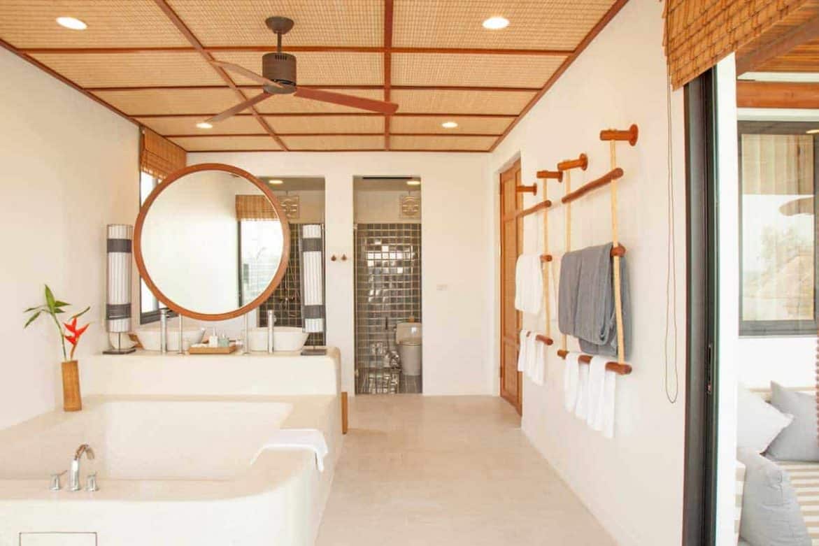 Bathroom soaker tub, vanity, shower, and water closet of the Three Bedroom Villa at the Royal Sands Koh Rong