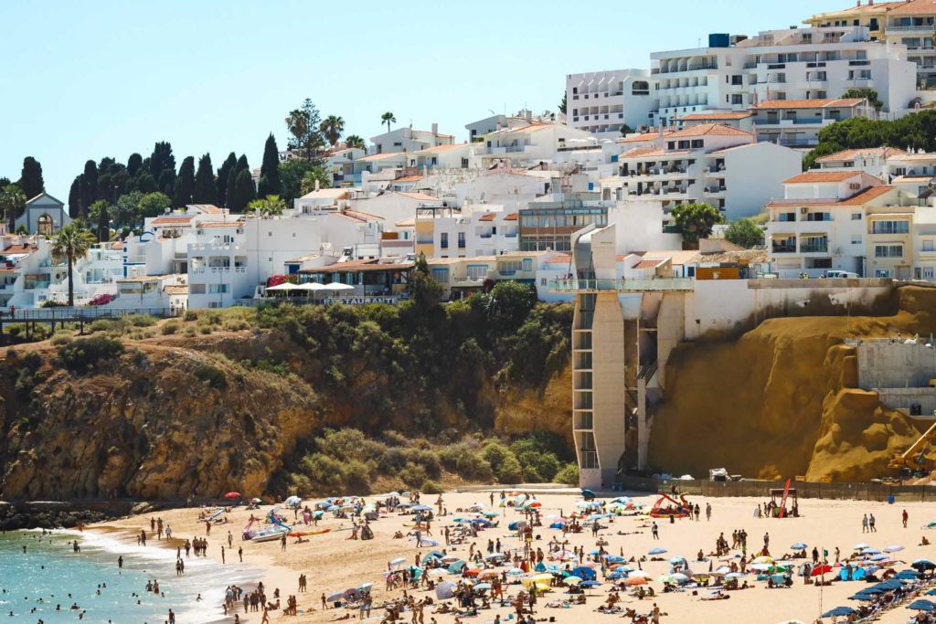 View of beach and seaside town in Albufeira, Portugal