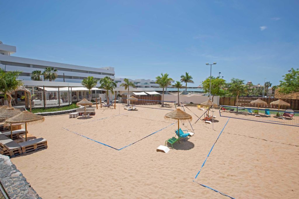 Outdoor sand volleyball courts at the Activate Sports Club | Bacbab Suites