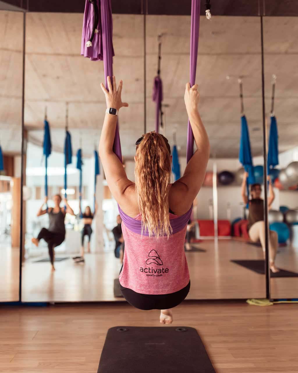 Woman doing pilates at Activate Sports Club | Baobab Suites