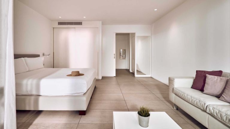 Divinity Studio suite bedroom and living area | Baobab Suites
