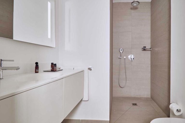 Serenity Pico suite bathroom with rain shower | Baobab Suites