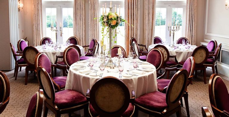 Formal set tables and chairs of Chaddesley Restaurant at Brockencote Hall