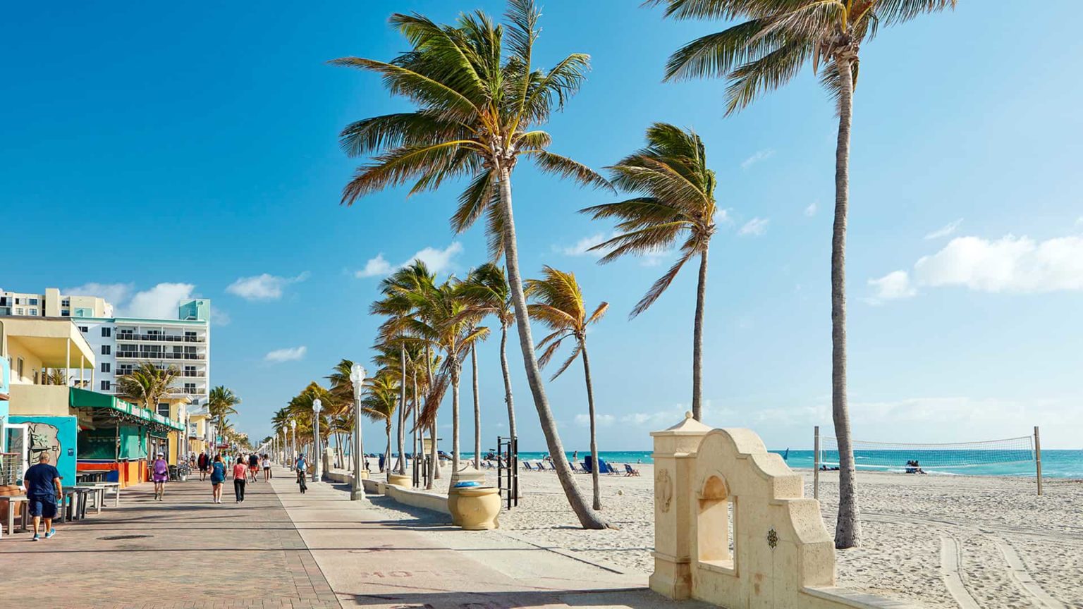 Hollywood Beach Boardwalk lined with palm trees