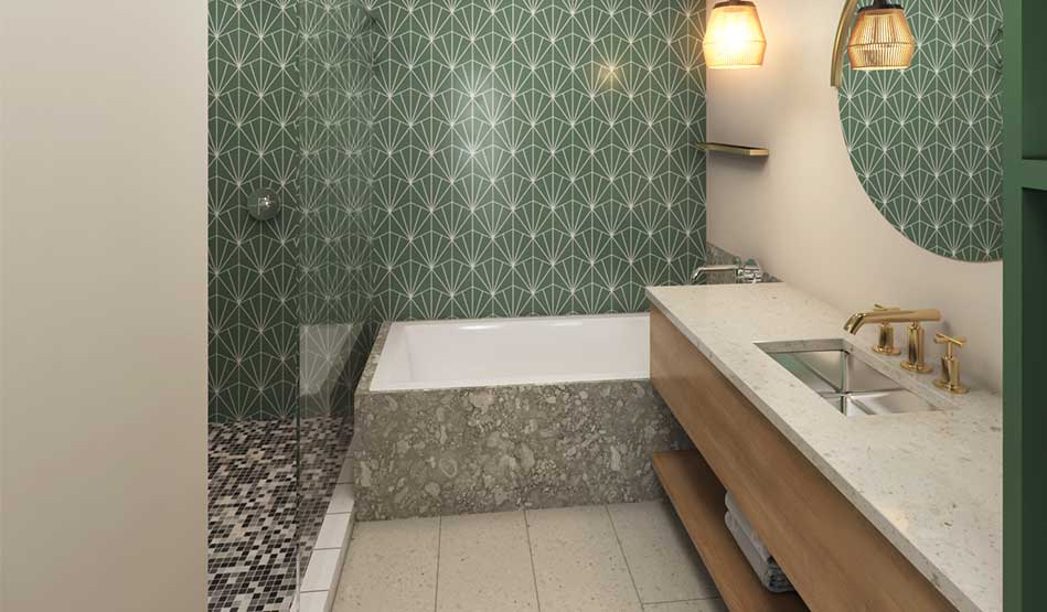 Baño de la suite con lavabo, ducha independiente y bañera separada en Embassy Suites by Hilton Orlando Sunset Walk