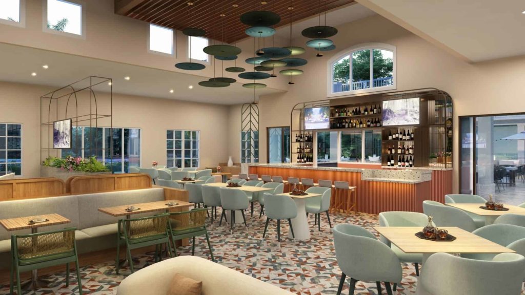 Clubhouse dining area and bar at Embassy Suites by Hilton Orlando Sunset Walk