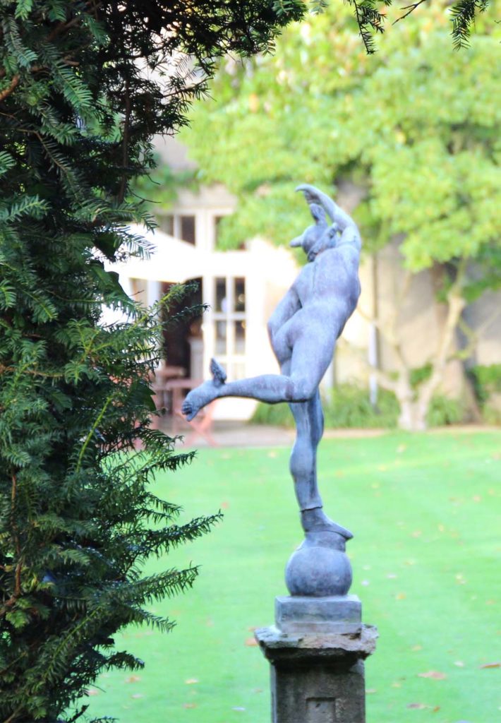 Hermes sculpture in the Greenway Hotel gardens