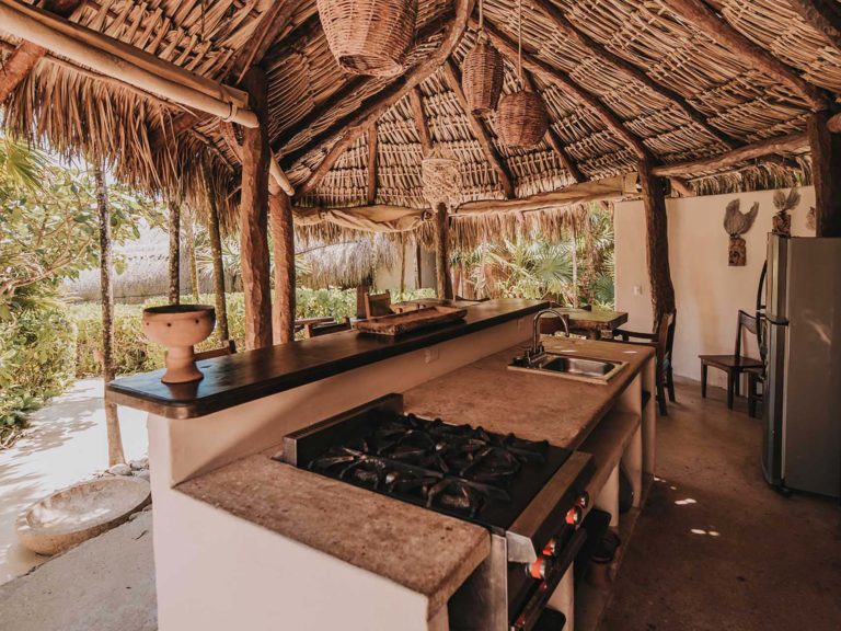 Casa Viento - covered patio with outdoor kitchen at the Papaya Playa Project
