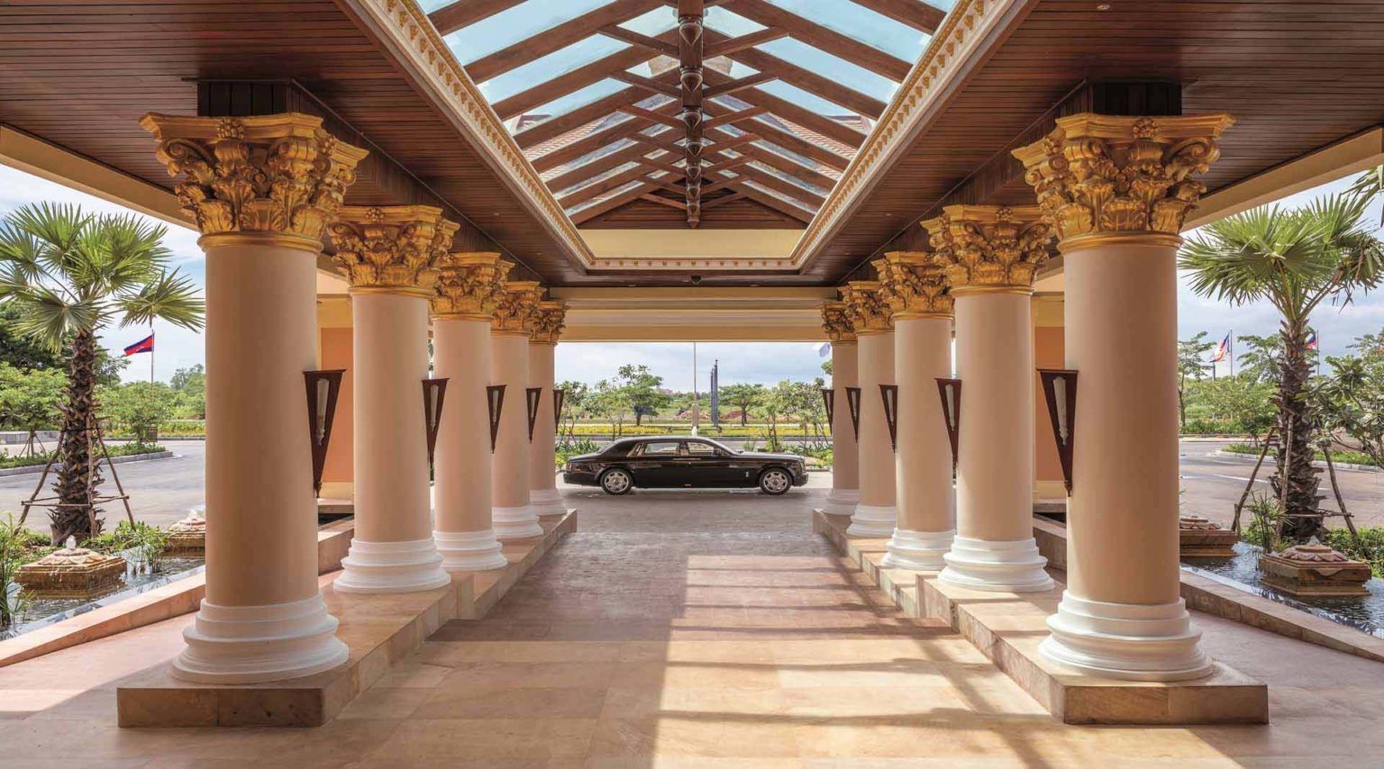 Luxury car under the overhang outside the Sokha Siem Reap Resort main entrance