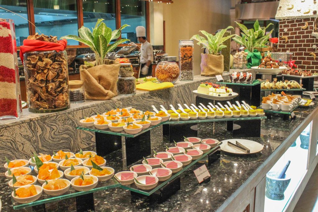 Buffet lined with dessers at Tumeric Restaurant of the Sokha Siem Reap Resort
