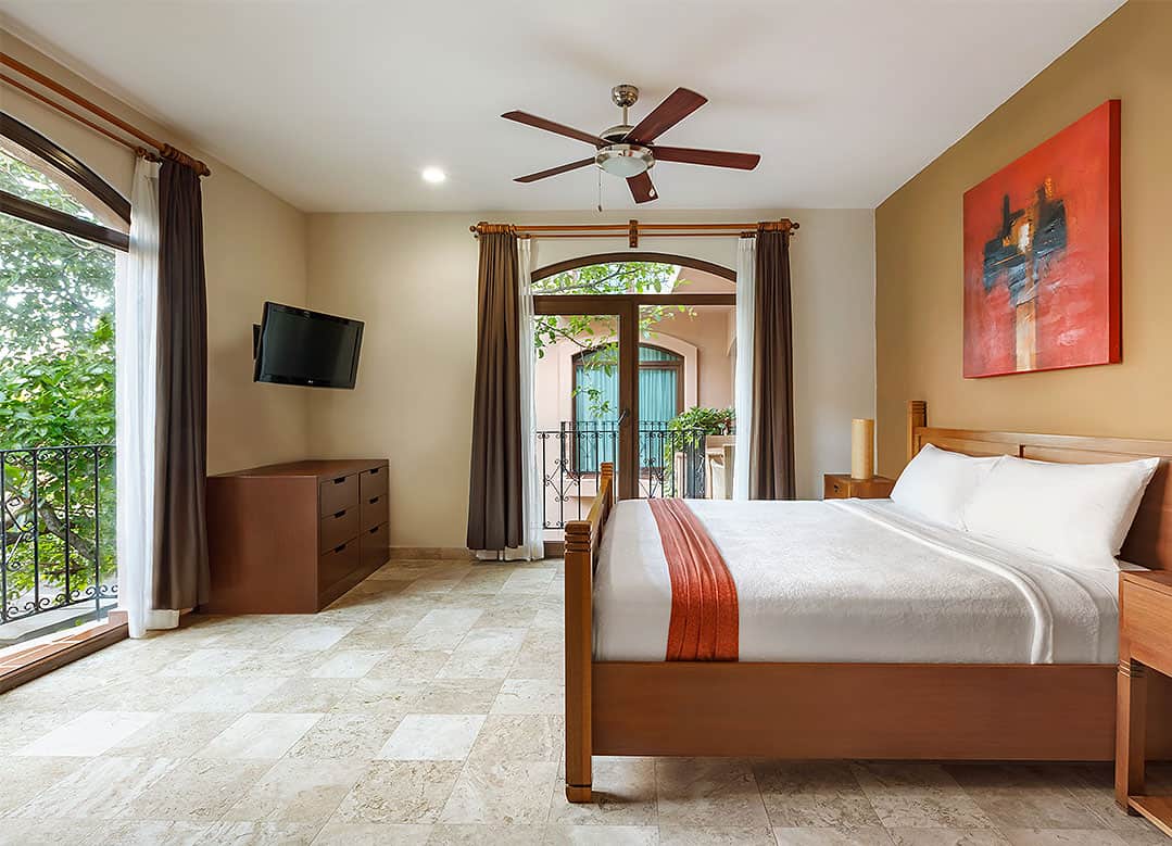 Bedroom suite with balcony at Acanto Hotel Playa del Carmen