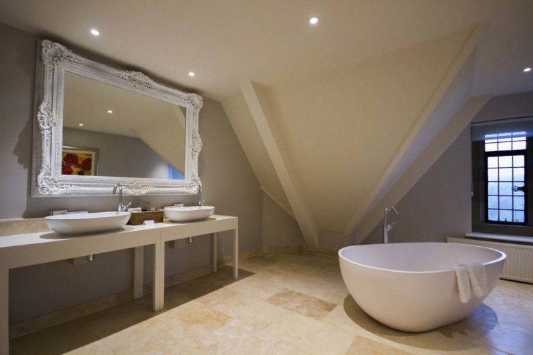Grand State Room - Bathroom with standalone tub, double vanity, and mirror | Bovey Castle