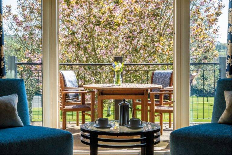 Castle Lodge - Outdoor deck with dining table and chairs | Bovey Castle