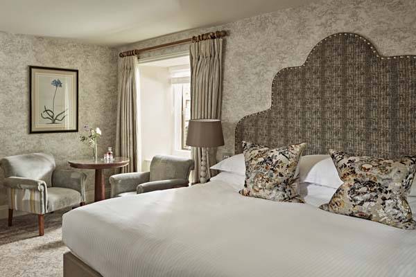 Castle Room - Bedroom with king bed and sitting area | Bovey Castle