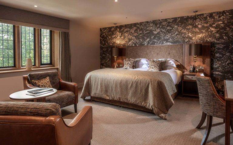 Orchard House Master Room - King bedroom with seating area and workstation | Mallory Court