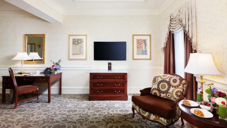 Chateau Club King - European inspired decor with sitting area, workstation, and TV | Nemacolin
