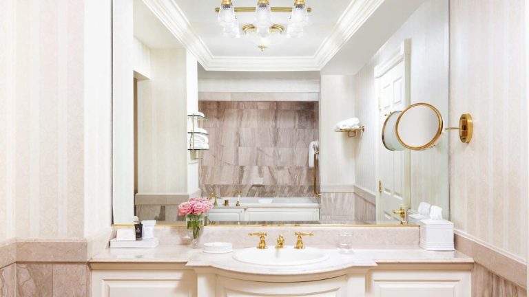 Chateau room - European inspired bathroom with vanity and large mirror | Nemacolin