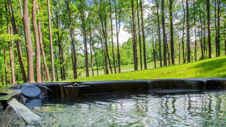 The Estates Dogwood - Outdoor hot tub with surrounded by woodlands | Nemacolin