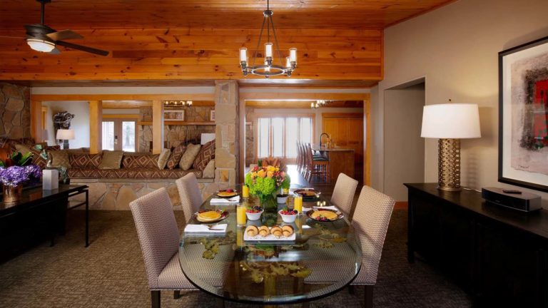 The Homes Deer Path Lodge - Rustic dining room with table and chairs | Nemacolin