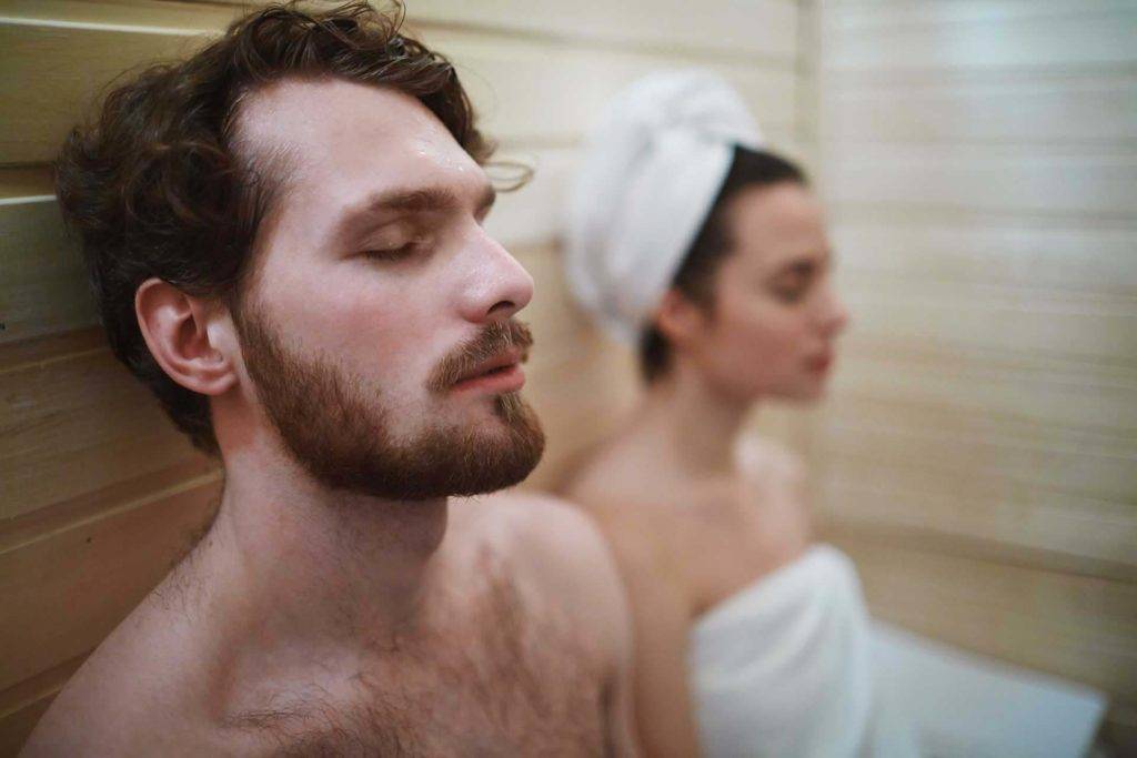 Couple resting in the spa sauna at the Shanti Maurice Resort