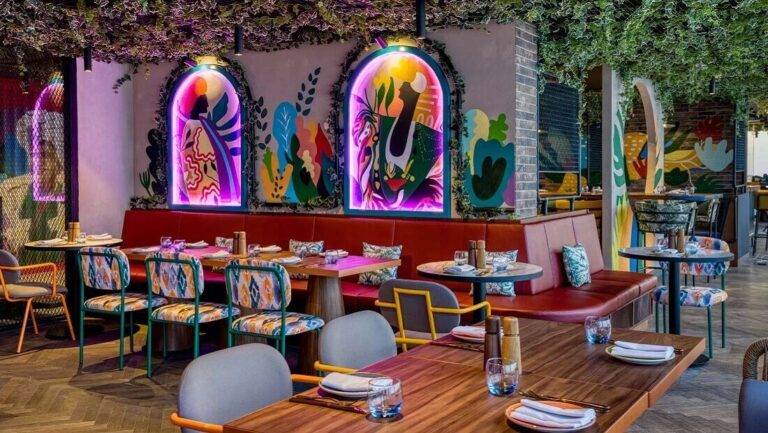 Colorful, Latin inspired restaurant interior of the Santè Ria Bar & Restaurant | First Collection JVC Hotel