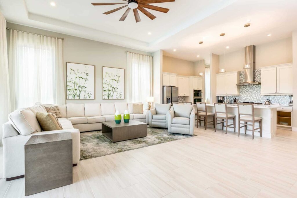 Upscale 6 bedroom vacation home living room and fully equipped kitchen at The Bear’s Den Resort Orlando